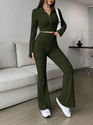 Ribbed knit flare co-ord set in army green with zip-up crop top and flared pants.