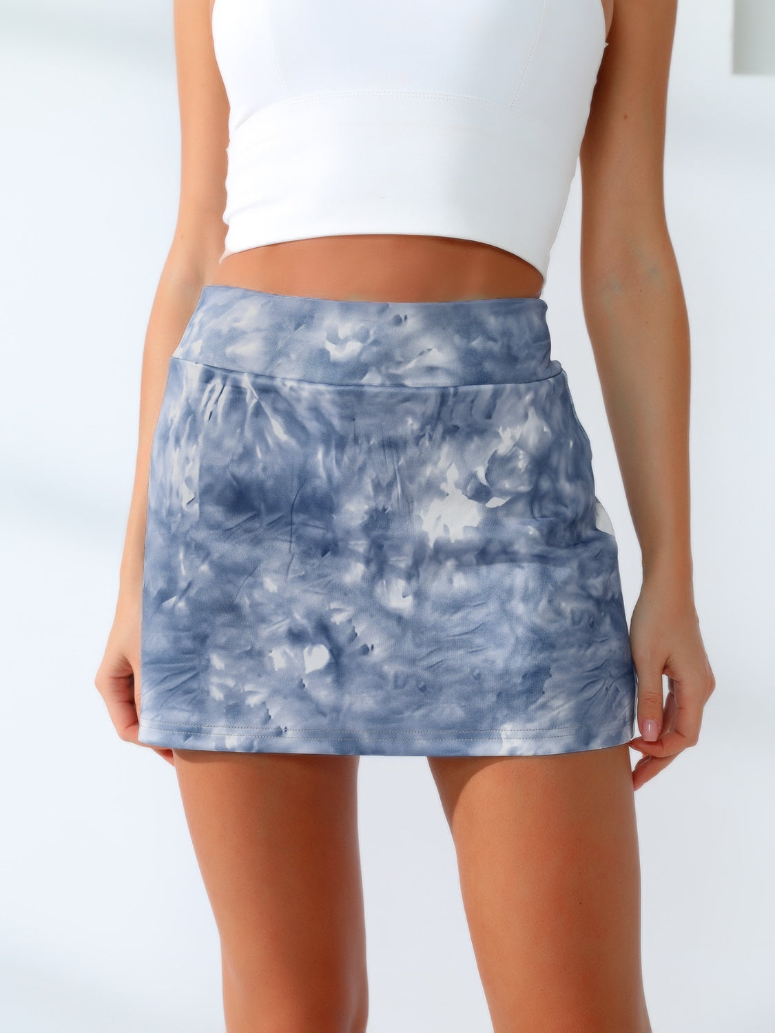 Tie-dye skort in dusty blue with an integrated pocket.