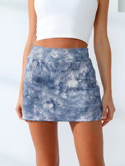 Tie-dye skort in dusty blue with an integrated pocket.