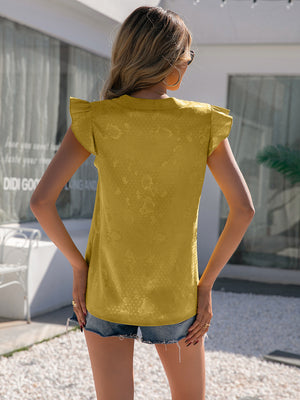 Yellow jacquard blouse with flutter sleeves and a keyhole detail.