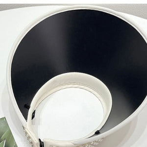 Pearl embellished white tweed visor with black brim
