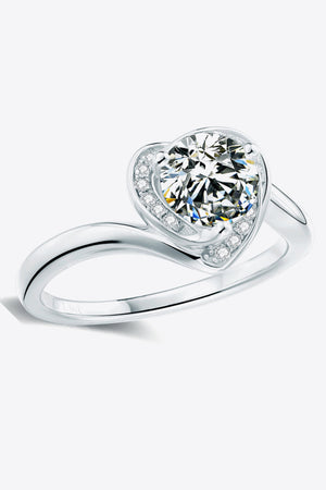Silver heart halo moissanite ring with a round center stone and pavé accents.