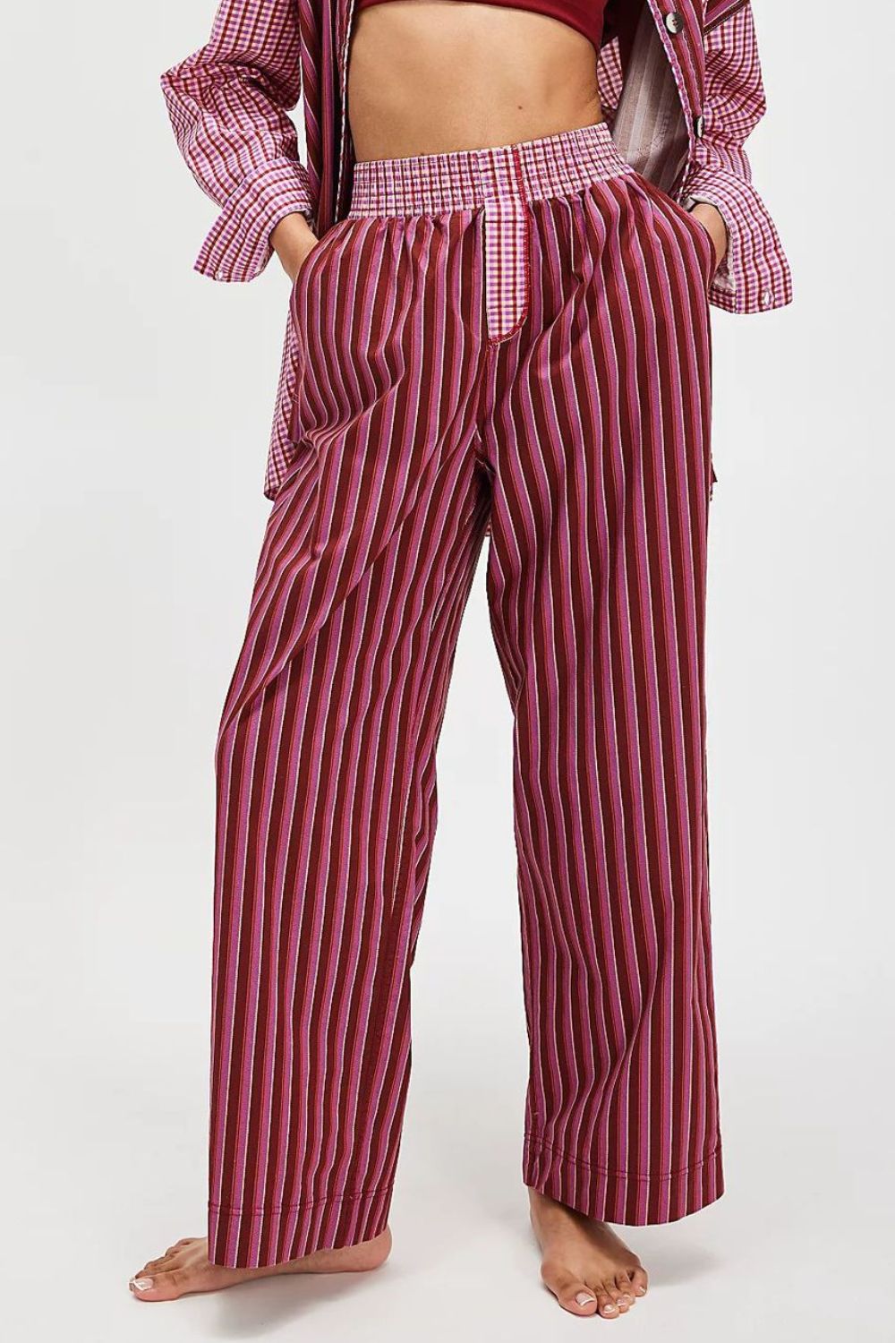Crimson stripe palazzo trousers in cotton with a gingham waistband.
