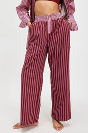 Crimson stripe palazzo trousers in cotton with a gingham waistband.