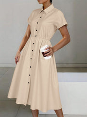 Beige button-down midi shirt dress with cinched waist, pockets, and classic collar.