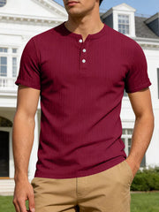 Burgundy ribbed short sleeve henley shirt with button placket.