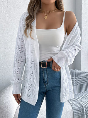 White openwork long sleeve acrylic cardigan with cable knit details.