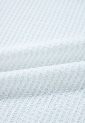 White waffle knit henley sweater fabric detail