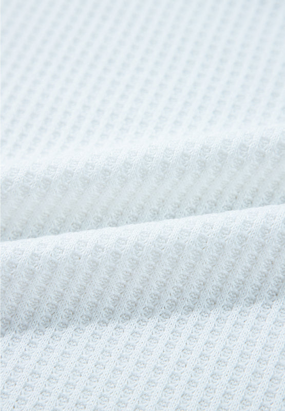 White waffle knit henley sweater fabric detail