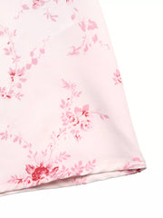 Romantic floral cami dress in pink with delicate rose print and frill detail.