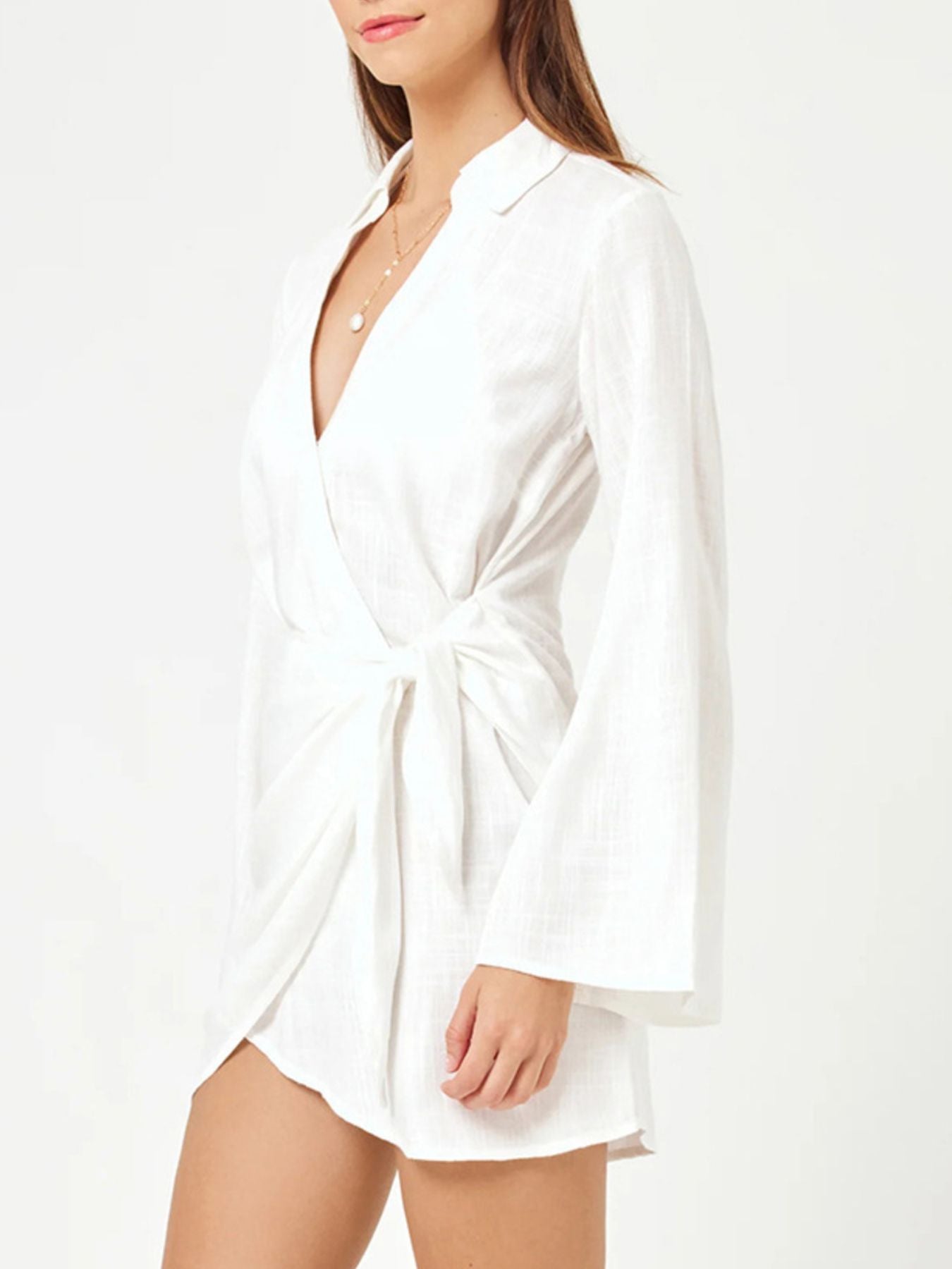 Chic white cotton blend wrap cover-up dress with long bell sleeves and tie waist.