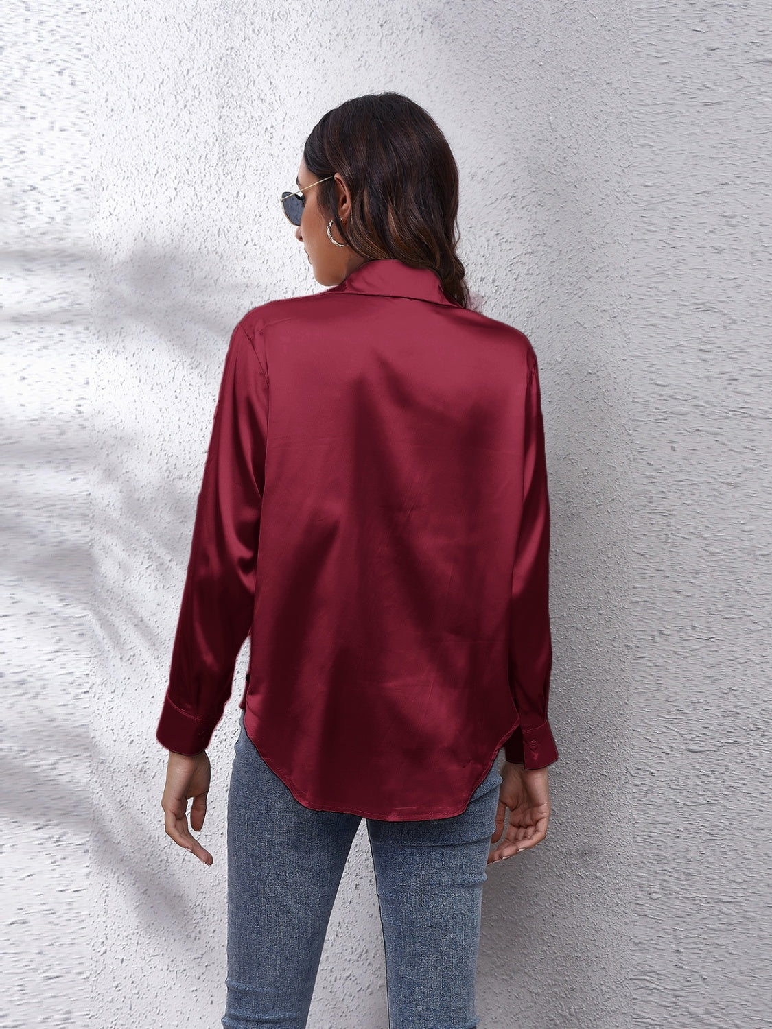 Burgundy silken button-down shirt with a relaxed fit and classic collar.