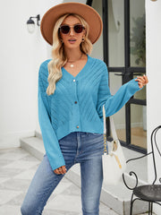 Cropped blue V-neck knit cardigan with button front and open knit detail.