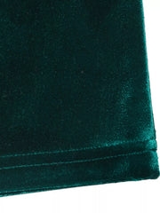 Green velvet maxi dress with ruched detail and V-neck.