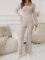 Striped knit top and flare pants set in apricot, featuring a scoop neck and long sleeves.
