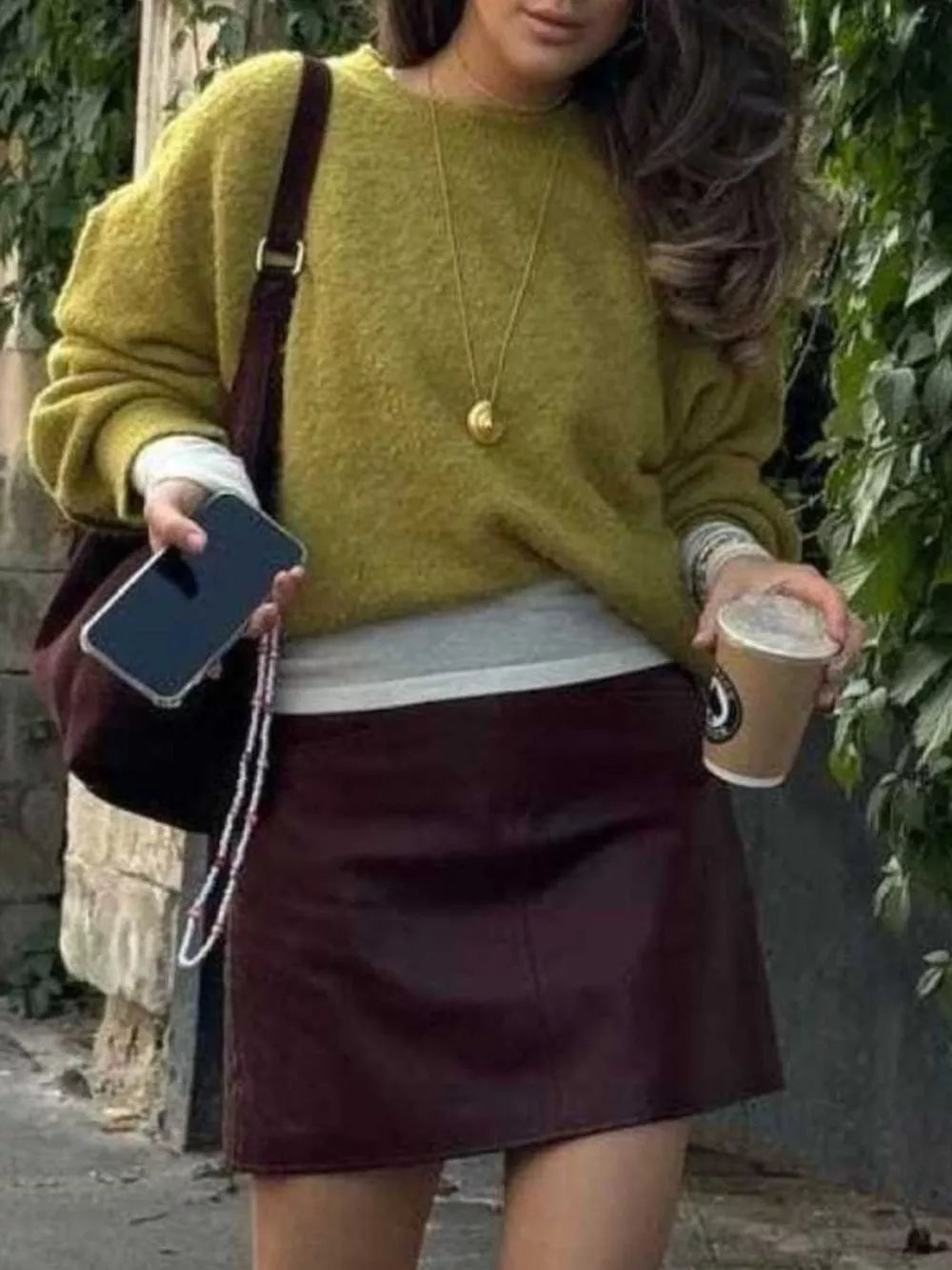 Cozy knit sweater in Moss with relaxed fit and crew neck.