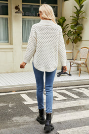 White textured diamond knit mock neck pullover sweater with long sleeves.