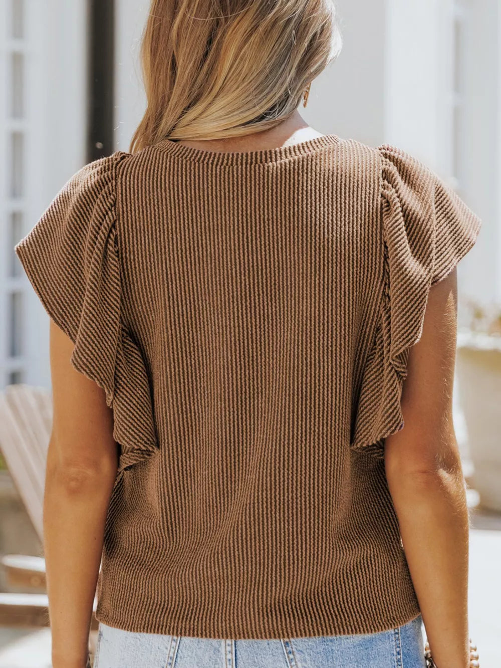 Brown ribbed t-shirt with ruffled short sleeves.