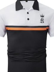 Colorblock polo shirt with crown graphic, black collar, white top, orange stripe, and black bottom.