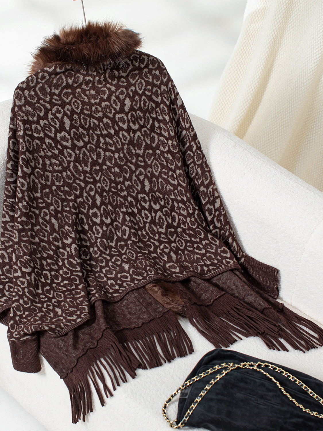 Brown leopard print cardigan with faux fur collar and fringed hem