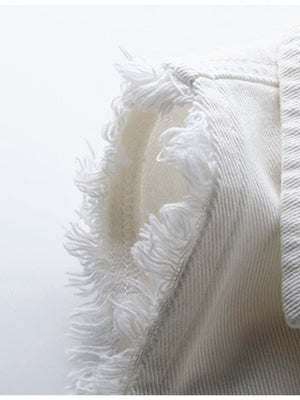 White denim vest with frayed shoulder detail