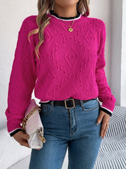 Hot Pink diamond knit sweater with contrast trim neckline and cuffs.