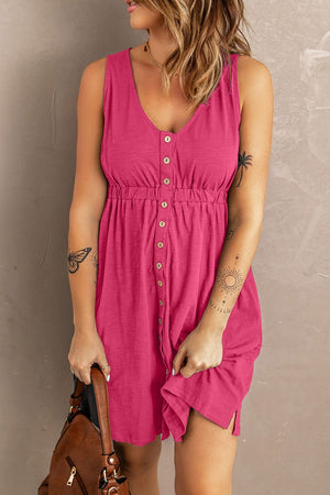 Pink button-down mini dress with gathered waistline and v-neck