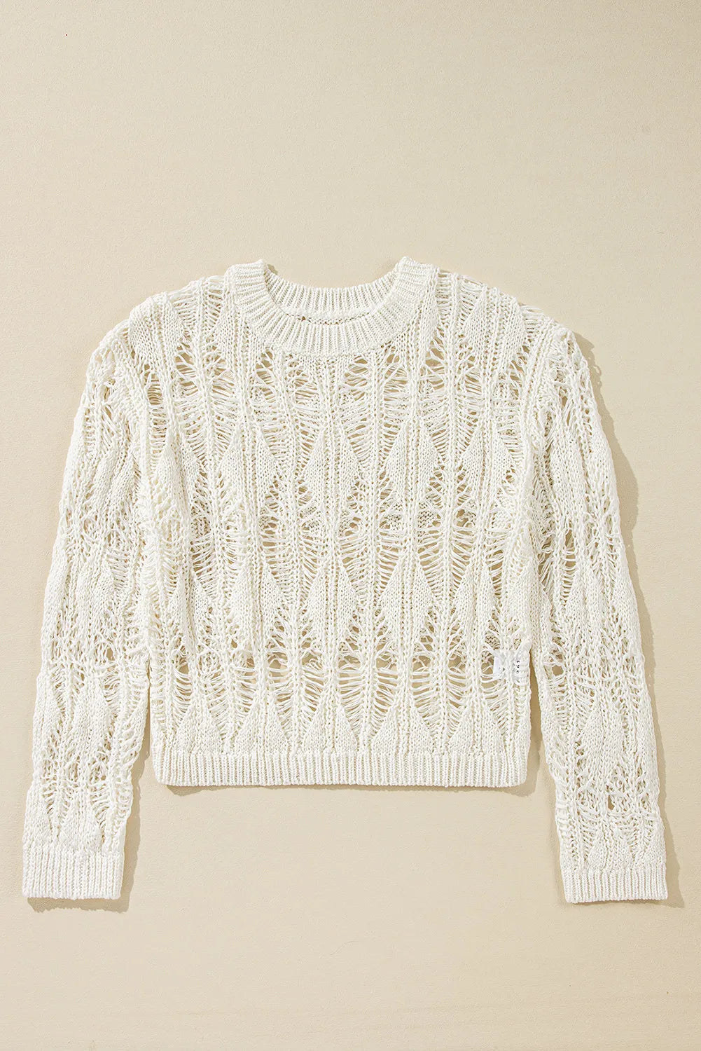 Ivory open-knit crochet sweater with diamond pattern and crew neck.