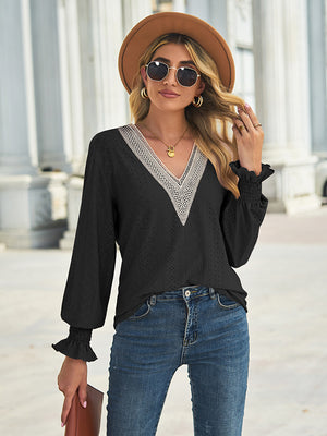 Black eyelet lace inset blouson sleeve top with ruffled cuffs