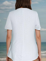 White eyelet maternity t-shirt with short sleeves and a V-neckline, showing the back detail.