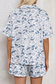 Blue camouflage print button-down pajama set with shorts.