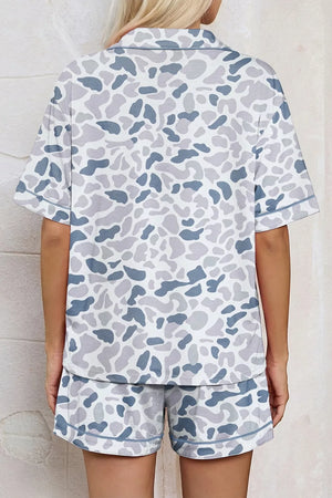 Blue camouflage print button-down pajama set with shorts.