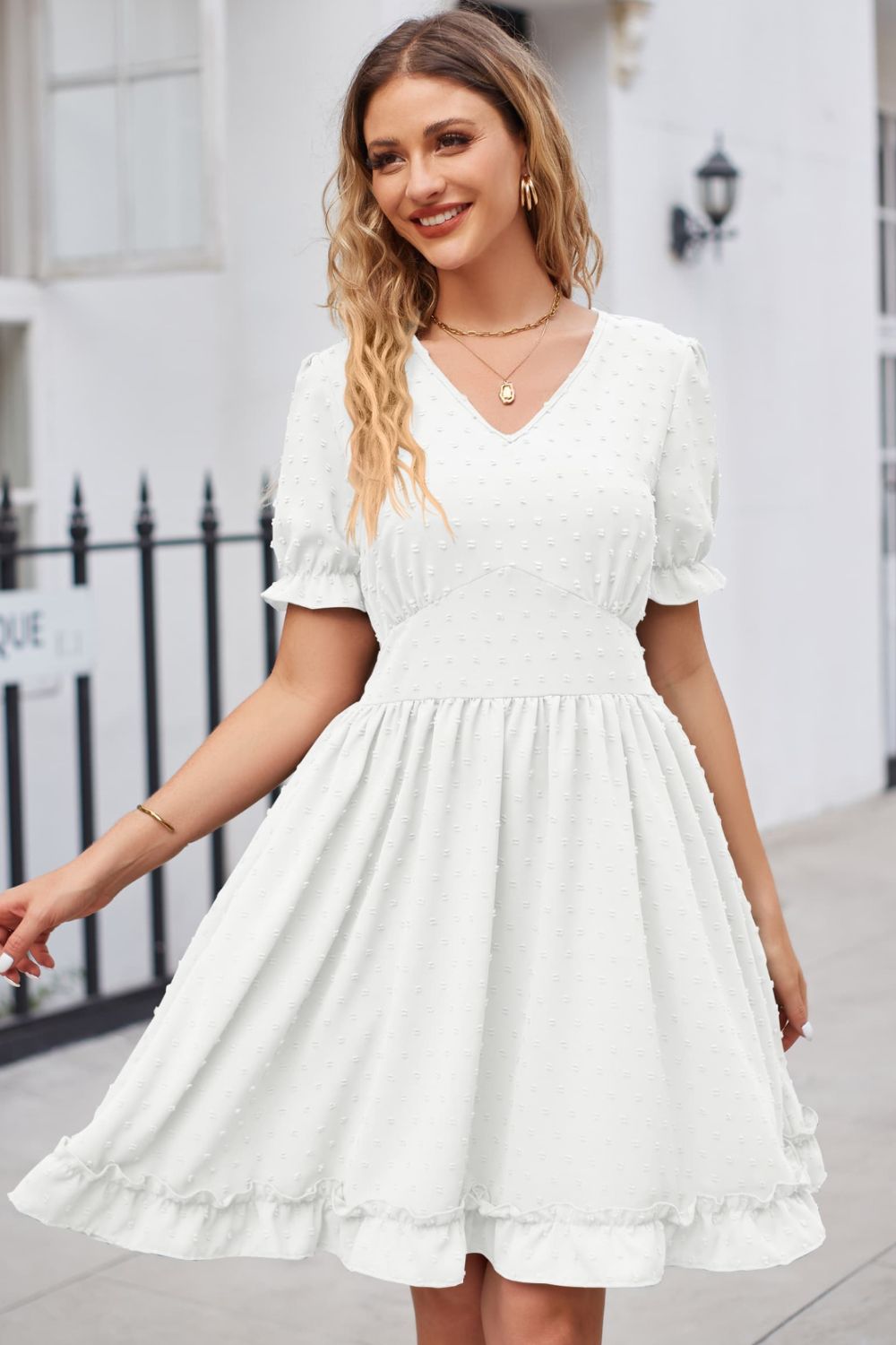 White textured dot puff sleeve fit-and-flare dress with ruffled hem