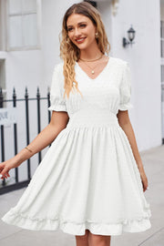 White textured dot puff sleeve fit-and-flare dress with ruffled hem