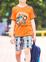 Toddler blue cotton graphic tee and plaid shorts set, casual and cheerful.