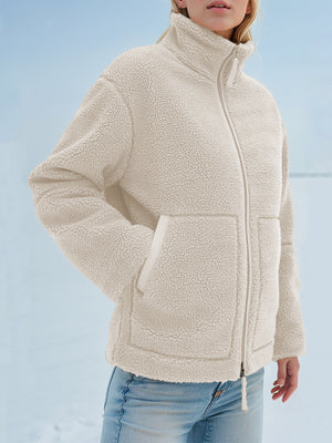 Tan sherpa stand-collar jacket with zip front and pockets