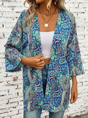 Teal paisley print kimono sleeve duster with open front and wide sleeves.