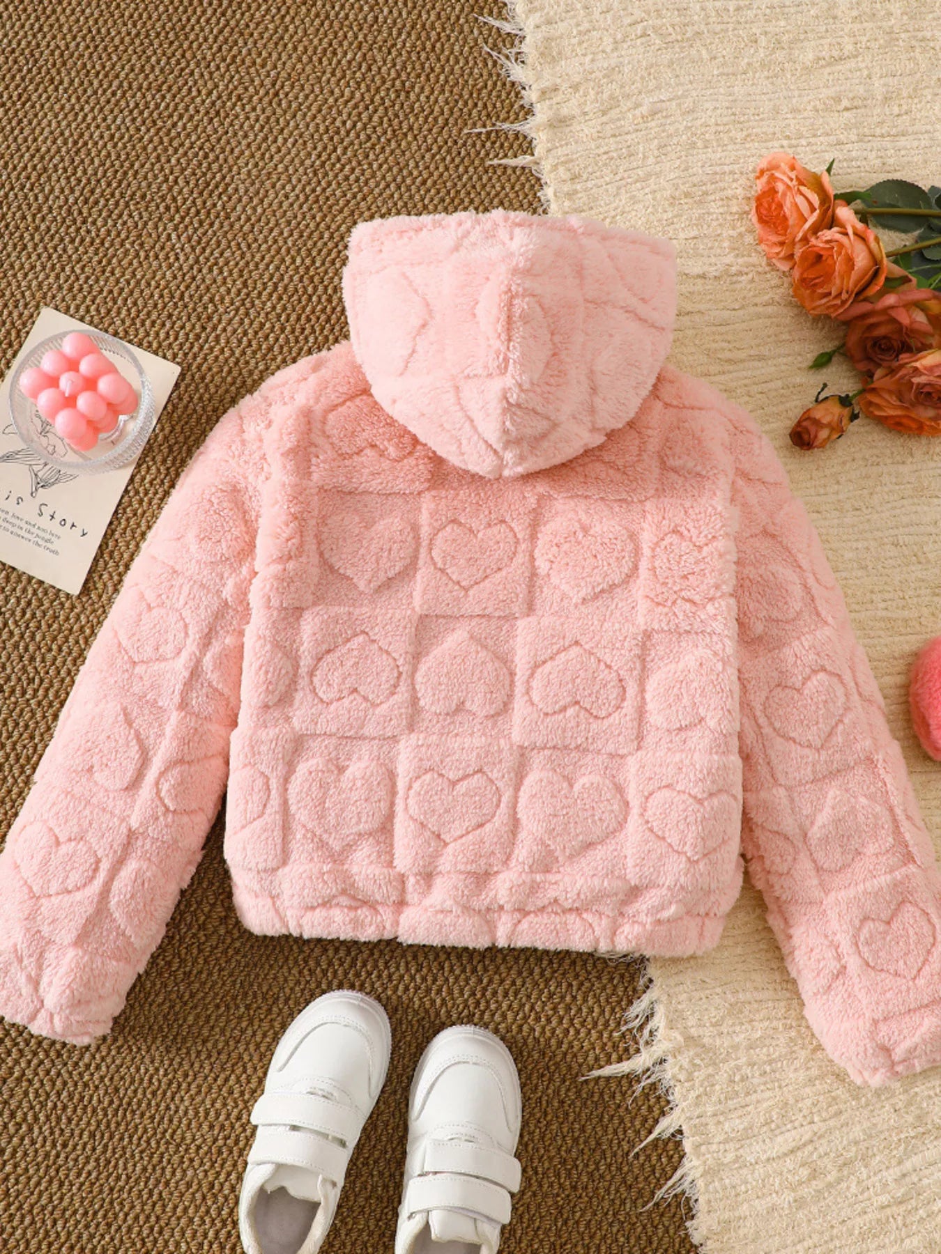Dusty pink fuzzy heart pattern hooded jacket with textured hearts.