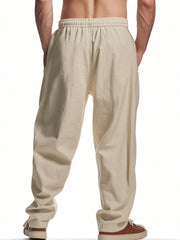Men's Khaki sweatpants with drawstring waist and relaxed fit.