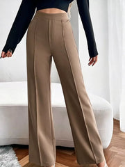 Brown high-waisted flare maternity pants with front seam detail.