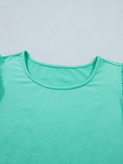 Eyelet lace ruffled cap sleeve top in mint green with a scoop neckline.
