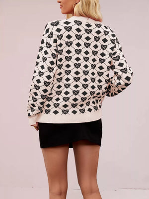 Heart & Diamond Argyle Knit Sweater in cream with black pattern.