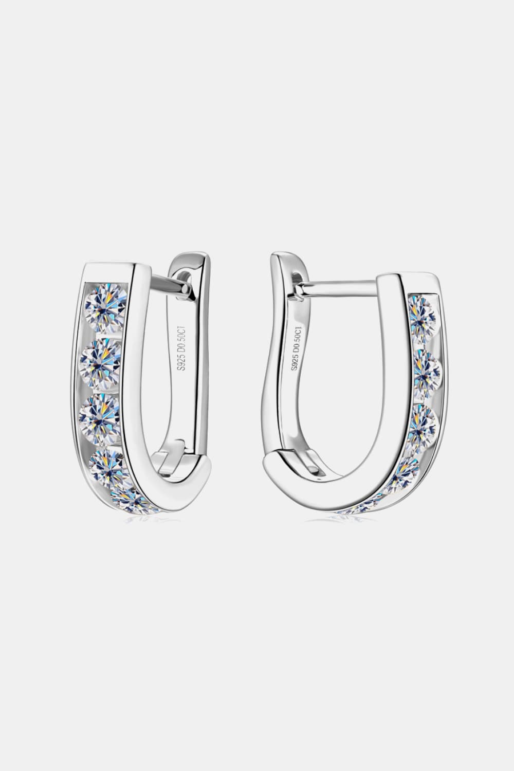 Silver pavé-set hoop earrings with clear cubic zirconia stones.