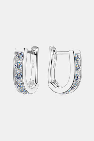Silver pavé-set hoop earrings with clear cubic zirconia stones.
