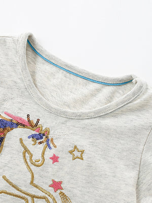 Toddler grey cotton dress with unicorn sequin embroidery and star details.