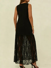 Black plus size maxi dress with sleeveless bodice and sheer lace skirt.