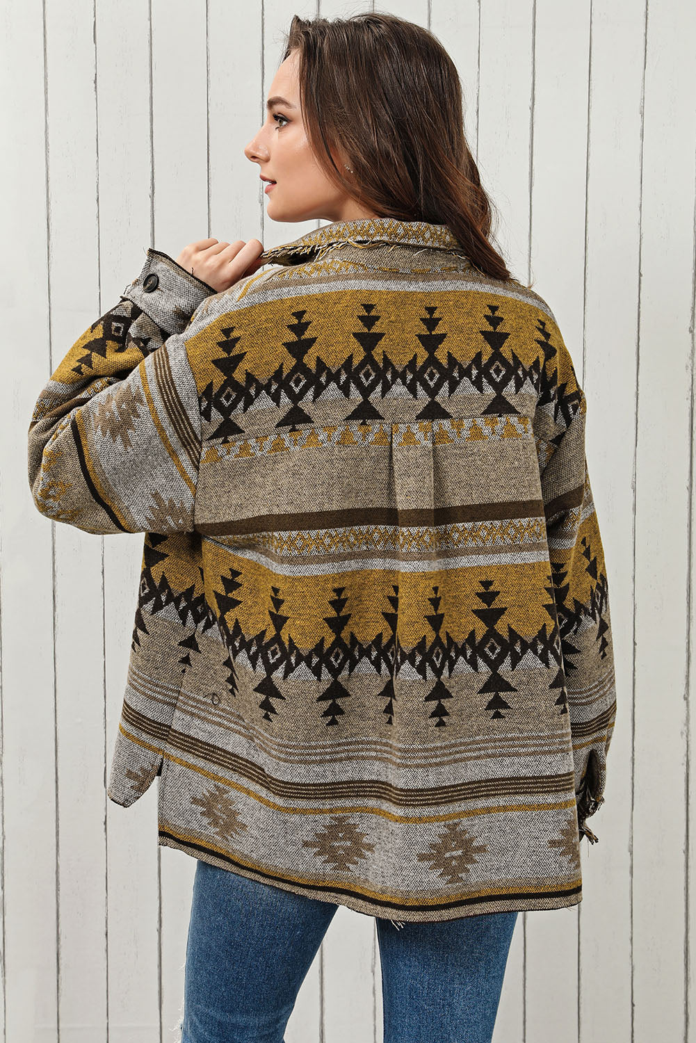 GeoChic collar jacket in camel with geometric pattern and pockets, styled casually.