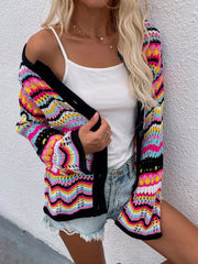 Rainbow chevron knit cardigan with black trim and button down front.
