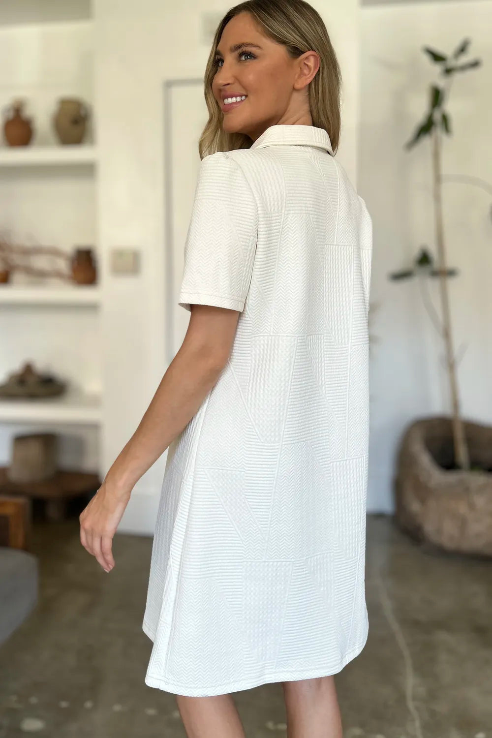 Ivory textured V-neck short sleeve mini dress with geometric pattern