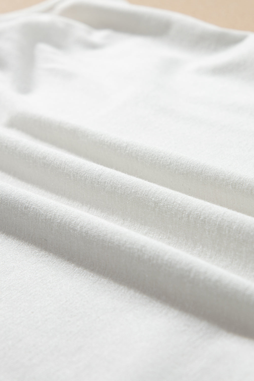 White sheer overlay tee and cami set fabric detail